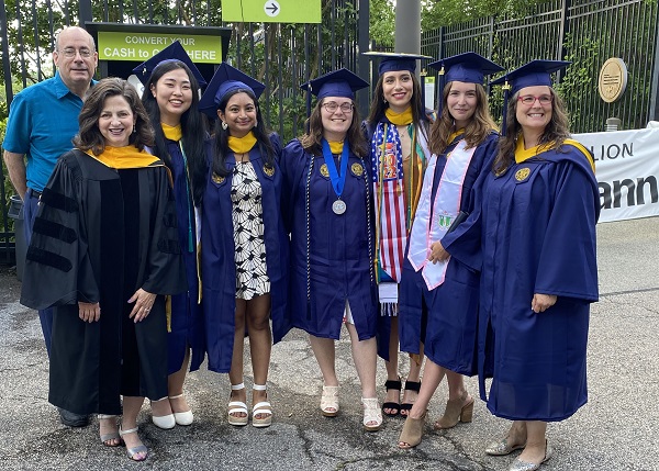 A group wearing Drexel University caps and gowns